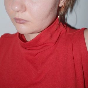 bright red mock neck shirt